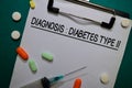 Diagnosis - Diabetes Type II write on a paperwork. Healthcare or Medical Concept