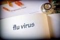 Diagnosis flu virus written in the diagnostic form and pills