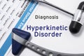 Diagnosis of Hyperkinetic disorder. Two neurological hammer, result of mental status exam and name of neurologic psychiatric diagn Royalty Free Stock Photo