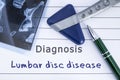 Diagnosis of Lumbar disc disease. Medical health history written with diagnosis of Lumbar disc disease, MRI image sacral spine and