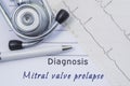 Diagnosis of Mitral Valve Prolapse. Stethoscope, printed electrocardiogram and pen are on paper medical form where indicated cardi