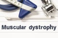 Diagnosis of Muscular Dystrophy closeup. Medical book guide for doctor neurologist with heading text of neurological disease Muscu