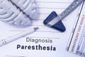 Diagnosis Paresthesia. Figure Brain, Neurological Hammer, Printed On A Paper Blood Test And Written Diagnosis Of Paresthesia In Th