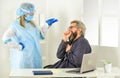 Diagnosis of pneumonia. Sars concept. Coronavirus symptoms. Doctor protective equipment examines male patient suspected Royalty Free Stock Photo