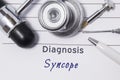 Diagnosis of Syncope. Medical doctor`s statement with diagnosis Syncope is on neurologist workplace, which are stethoscope, hammer Royalty Free Stock Photo