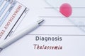 Diagnosis Thalassemia. Written by doctor hematological diagnosis Thalassemia in medical report, which are result of blood test and