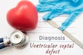 Diagnosis Ventricular septal defect. Figure heart, stethoscope, surgical scalpel and gloves are near title Ventricular septal defe