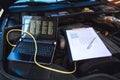 Diagnostic machine ready to be used with car Royalty Free Stock Photo