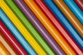 Diagonal background of multicolored rainbow colored pencils