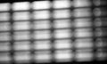 Diagonal black and white grid bokeh background