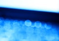 Diagonal blue laptop keyboard bokeh background