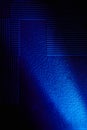 Diagonal bright blue ray of light crosses the background with a pattern Royalty Free Stock Photo