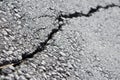 Diagonal close detail of a pavement crack