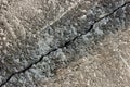 Diagonal crack in concrete - rough cement texture Royalty Free Stock Photo