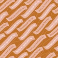 Diagonal handmade by me clothing labels in different languages, French, German, Spanish on orange background. Seamless