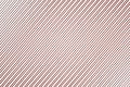 Diagonal line structure on pink plastic sheet surface, abstract Royalty Free Stock Photo