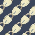 Diagonal lock figures seamless pattern. Navy blue colored background. Beige and light yellow door elements Royalty Free Stock Photo