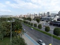 Diagonal low aerial view of buildings and motorway