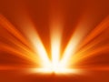 Diagonal orange blast of sunlight rays background