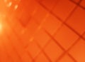 Diagonal orange grid bokeh background