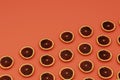 DIagonal placed graipfrut slices on orange background, fruity background concept, 3d rendering