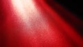 Diagonal rays of light on a red or scarlet background. Blurred abstract background light effect, light leaks. Side