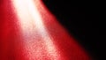 Diagonal rays of light on a red or scarlet background. Blurred abstract background light effect, light leaks. Side