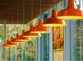 Diagonal row of orange lamps bokeh background