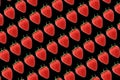 Diagonal rows of strawberries isolated on a black background