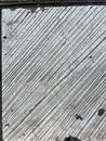 Diagonal scratches on a concrete surface