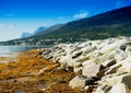 Diagonal stony beach landscape background Royalty Free Stock Photo