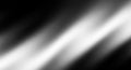 Dark Gray and Bright White Diagonal Streaks Abstract Background with Smooth Gradient and Light Reflection Royalty Free Stock Photo