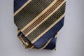 Diagonal stripe tie fabric texture close-up on a gray background Royalty Free Stock Photo