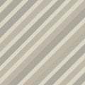 Diagonal stripes in neutral tones of beige and gray create a simple, repetitive pattern. Royalty Free Stock Photo