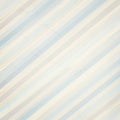 Diagonal stripes in pastel hues of blue and beige create a soft, vintage pattern. The li Royalty Free Stock Photo