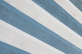 Diagonal view of blue and white parget striped wall background. Sharp surface. Royalty Free Stock Photo