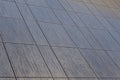 Diagonal view of brown tile ceramics of different shapes and detailed pattern on floor, for design projects