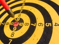 Diagonal view of an used dartboard