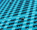 Diagonal windows of aqua building background Royalty Free Stock Photo