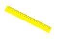 Diagonal yellow twenty centimetres ruller isolated