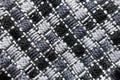 Diagonally embroidered thick grey fabric