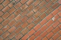 Diagonally layered red brick wall texture background. Building material concept. Industrial background empty grunge