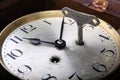 Dial of analog clock and a clockwork key Royalty Free Stock Photo