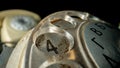 Dialing disc of an old dirty telephone with round hole and number four. Macro shot of retro rotary phone with Royalty Free Stock Photo