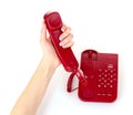 Dialing on the red phone Royalty Free Stock Photo