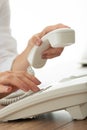 Dialing telephone number using landline phone