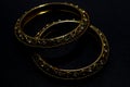 Diamond bangles ring jewellery vintage artifact on black background.