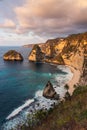 Diamond beach in a beautiful morning sunrise in cloudy day, Nusa Penida island near Bali island, Indonesia Royalty Free Stock Photo