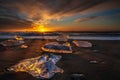 Sunrise at Diamond beach, near Jokulsarlon glacier lagoon Royalty Free Stock Photo