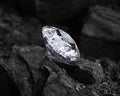 diamond on black coal background Royalty Free Stock Photo